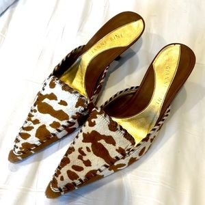 Fun cow print calf hair kitten heel mule.